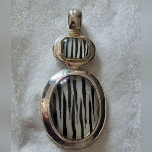 Elegant Sterling Silver Pendant With Zebra Print Accent